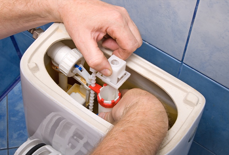 How to Fix a Running Toilet with a Button Flush